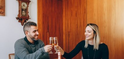 man and woman sitting at table