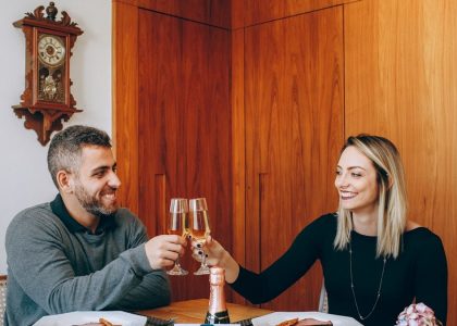 man and woman sitting at table